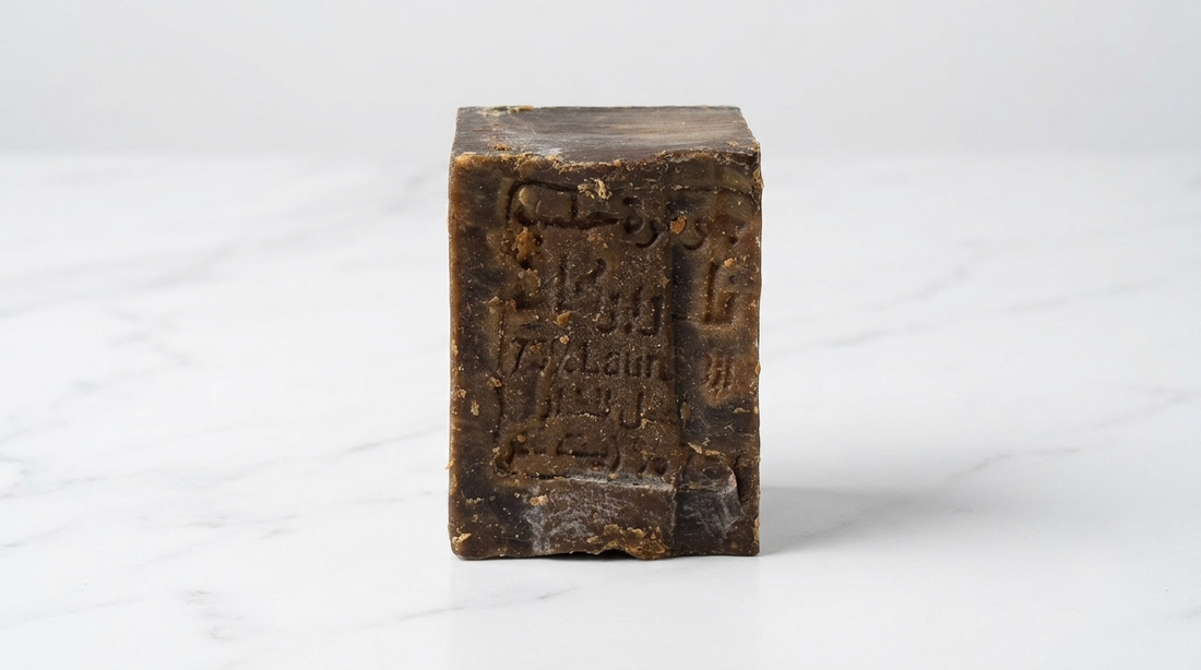 Avlia 75% Laurel Oil Aleppo Soap bar on clean white marble with clinical precise lighting, antifungal natural soap