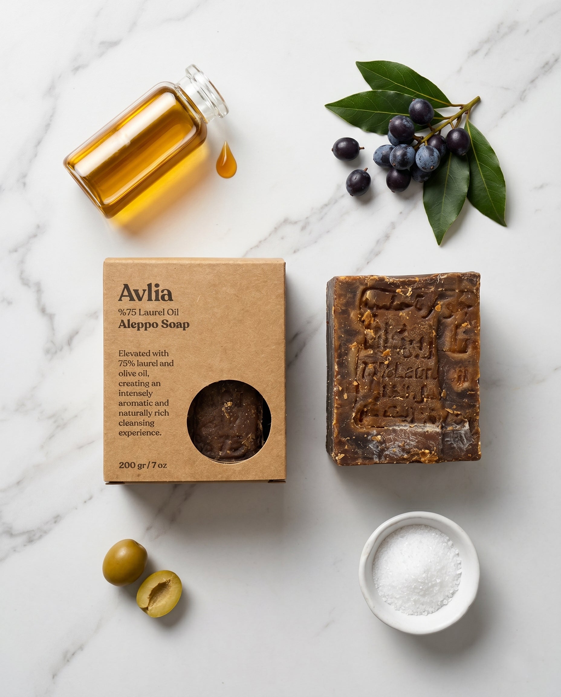Avlia Aleppo Soap bar with olive oil and bay laurel berry ingredients on white marble, 4-ingredient natural handmade soap — olive oil, laurel berry oil, water, lye only