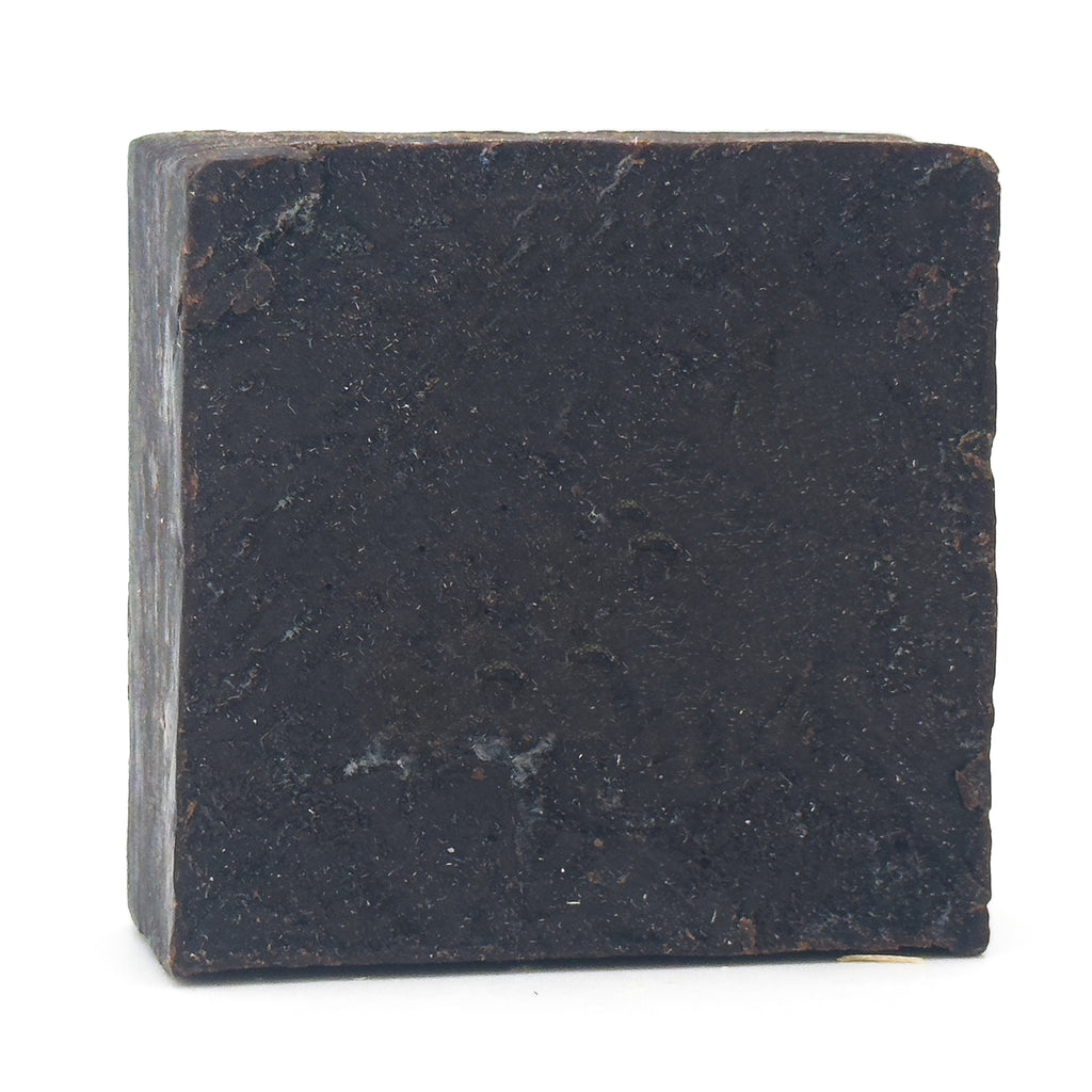 Avlia Pine, Juniper Tar & Sulfur Soap Bar — front view of the hand-cut, near-black artisan soap block on a white studio background, natural sulfur soap 4.8 oz