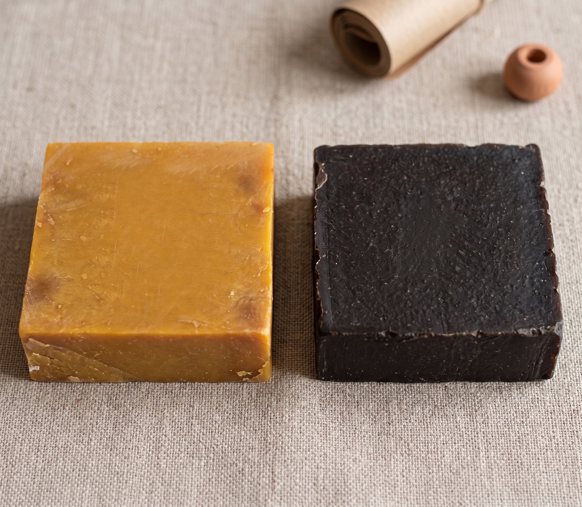 Avlia Pure Sulfur Soap beside the Pine, Juniper Tar & Sulfur Soap, showing two distinct sulfur traditions.
