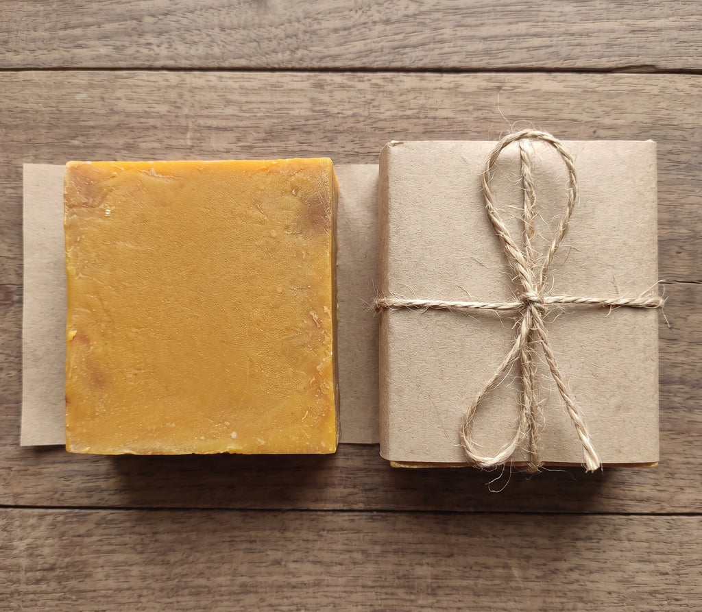 Avlia Pure Sulfur Soap with plain kraft wrap and jute twine, minimal packaging flatlay.