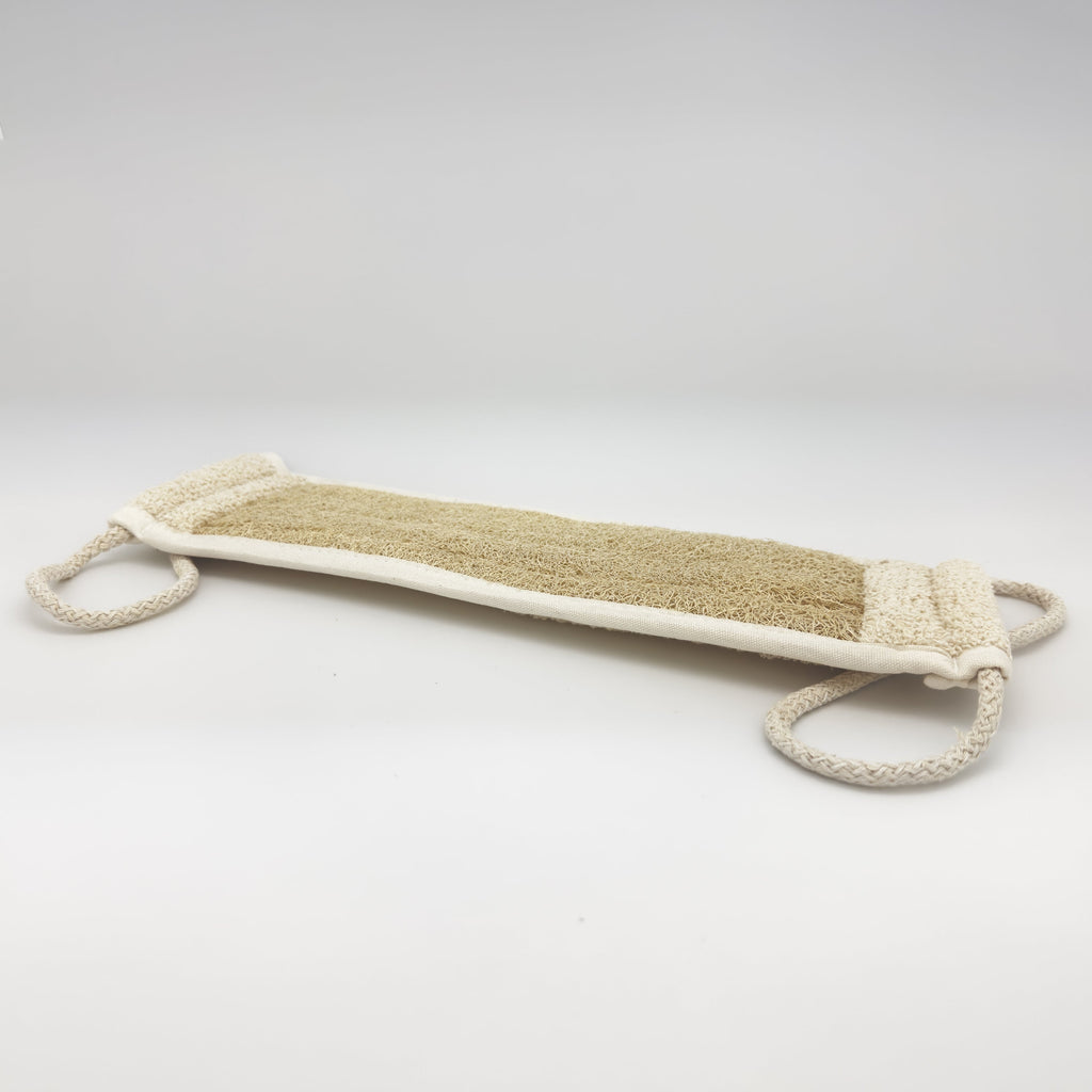 Avlia handmade loofah back strap in perspective, two cream braided cotton loops at the short ends for two-handed pulling across the back