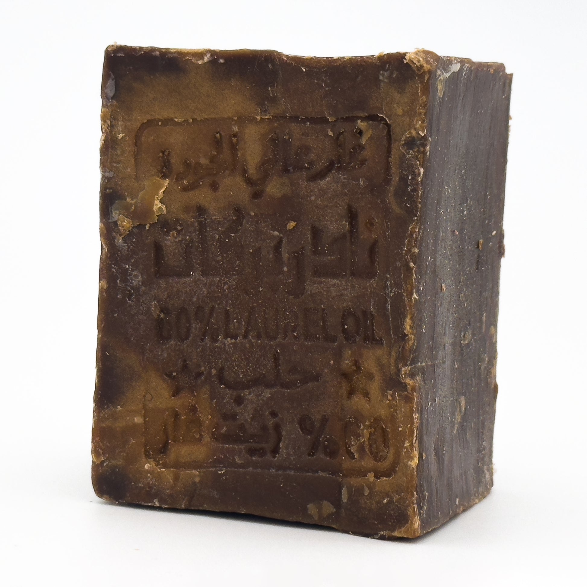 Avlia brand 60% laurel oil Aleppo soap bar standing upright, angled view showing side thickness
