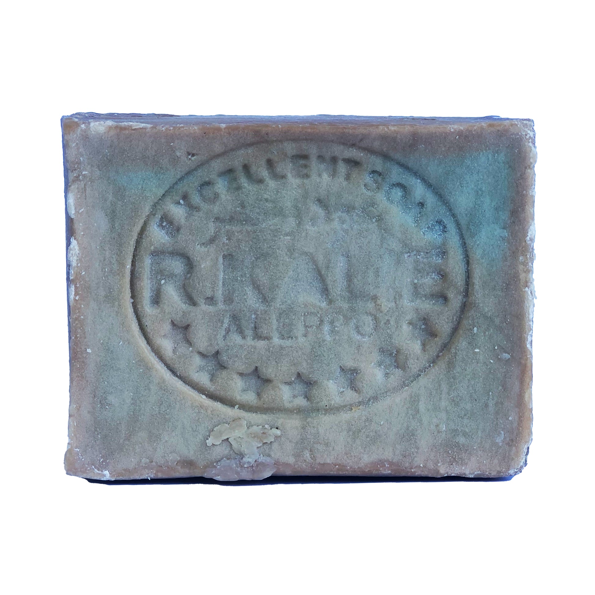 Close-up of handmade olive oil soap with amber notes