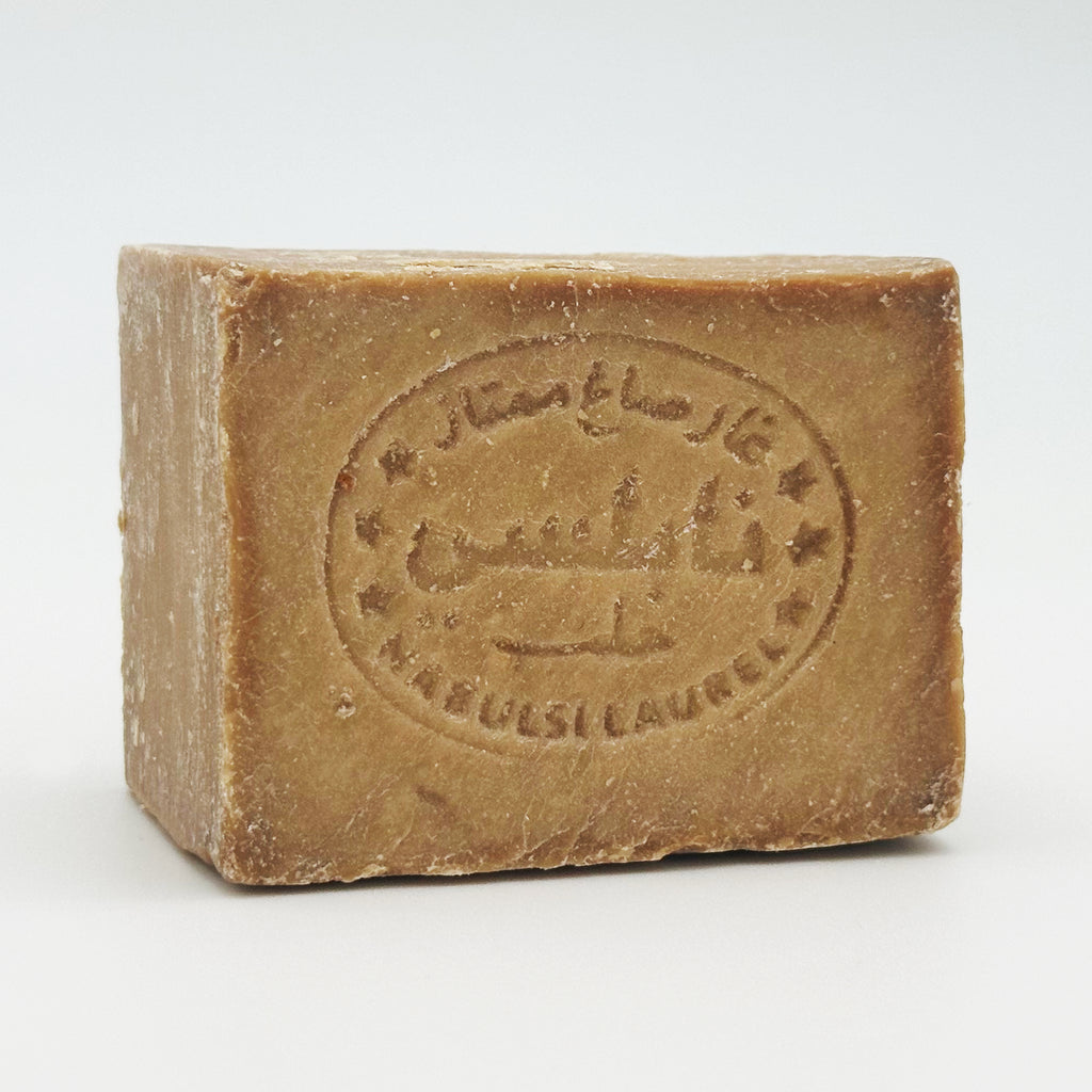 Detailed front view of Avlia Nablus soap bar with traditional stamped markings