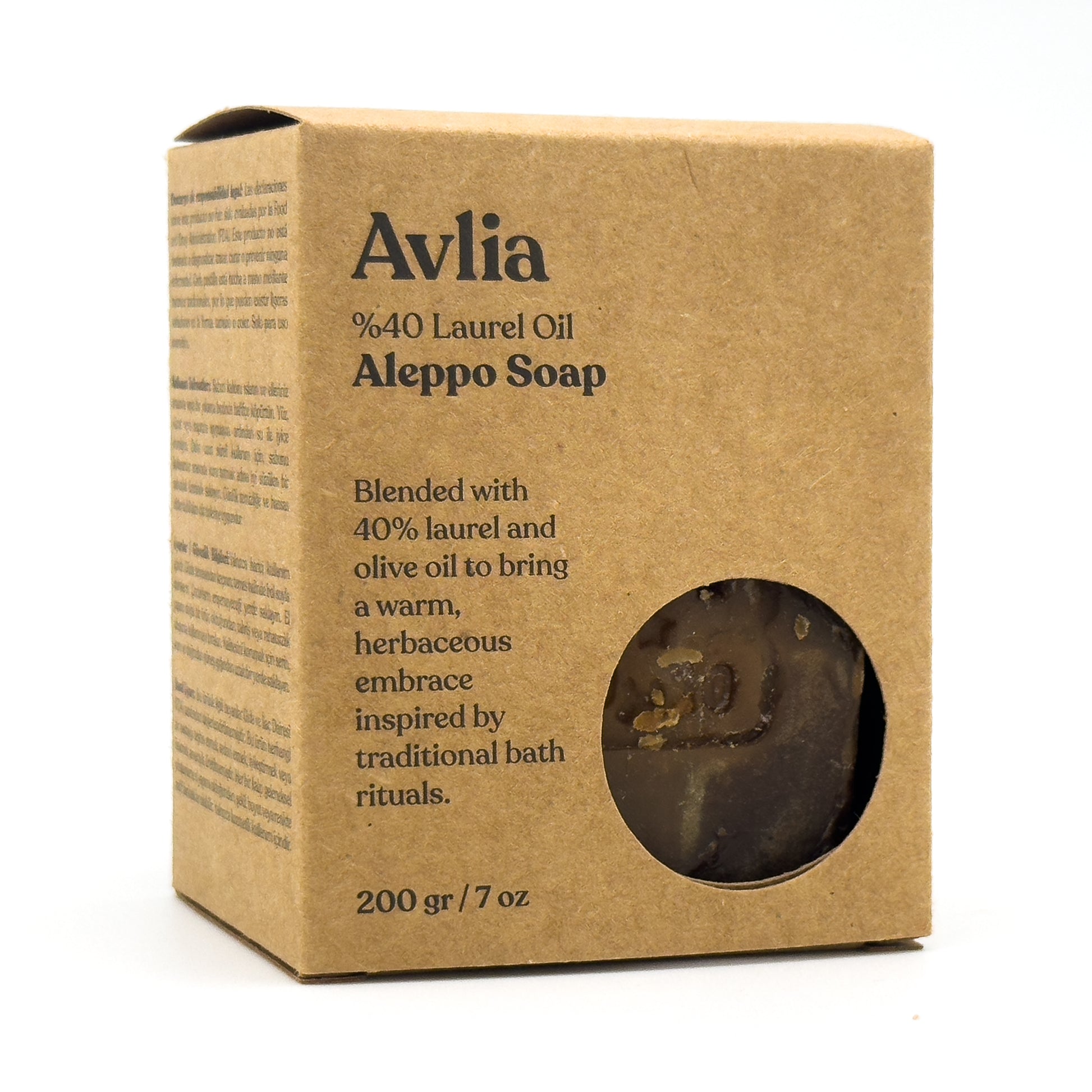 Front and left side view of the Avlia soap packaging box, featuring a circular window revealing the soap inside Portrait