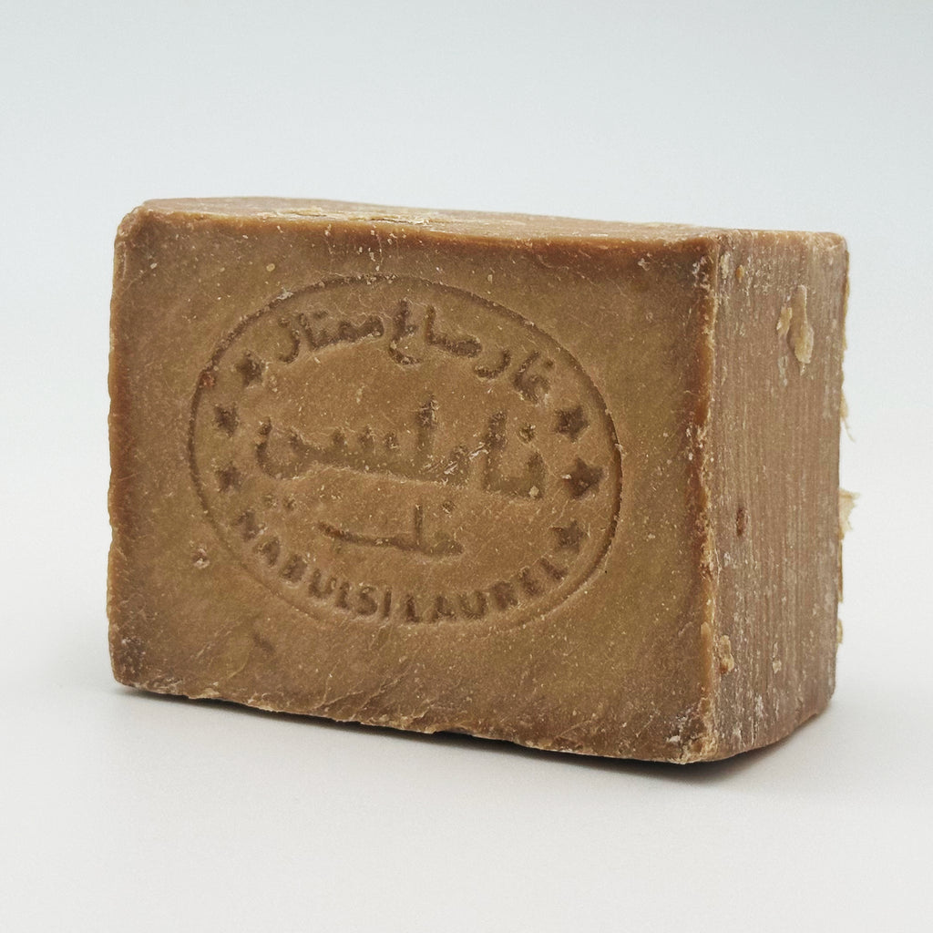 Front view of a rectangular Avlia Nablus soap bar with Arabic and English imprint