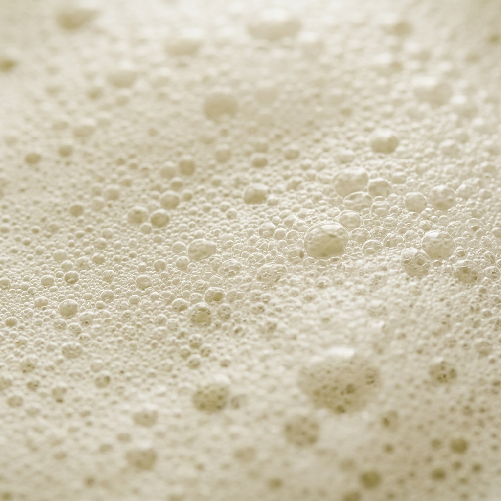 Macro close-up of rich lather bubbles from the Avlia wild pistachio soap.