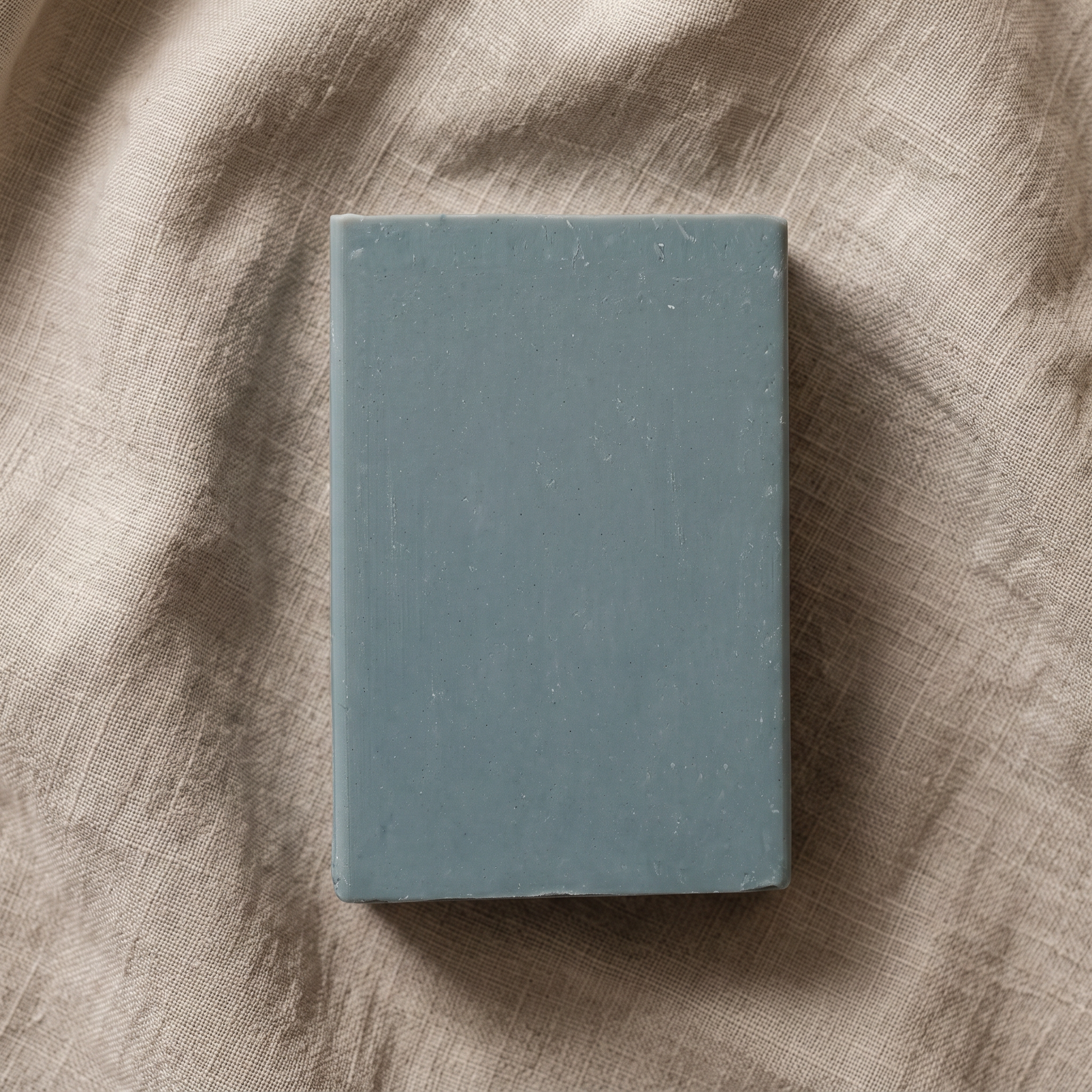 Avlia Retinol Soap Bar flat-lay on natural linen, plain and clinical