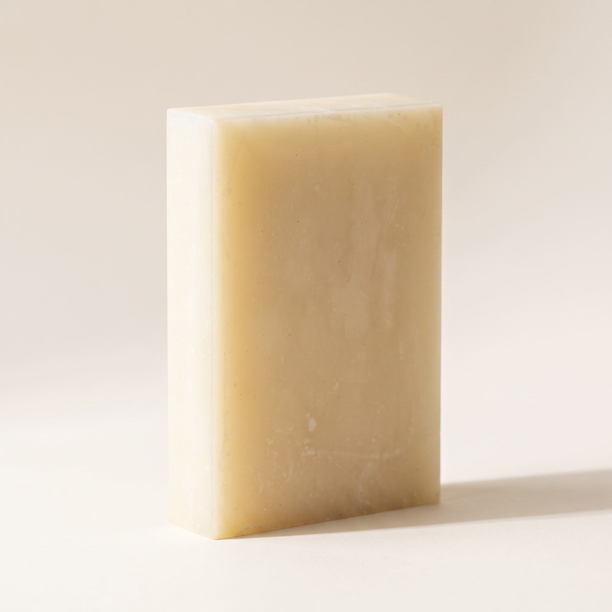 Avlia Snail Mucin Soap Bar standing on edge showing hand-cut thickness