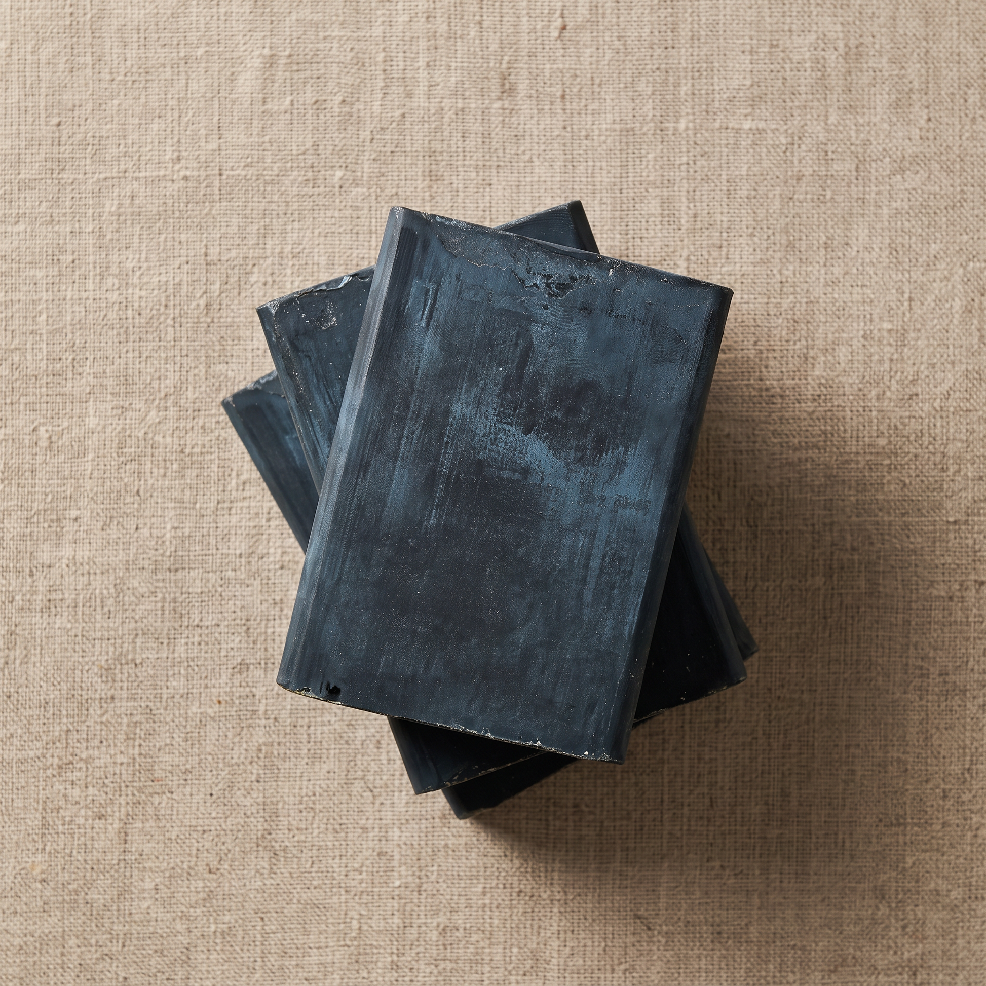Three Avlia African Black Soap Bars stacked showing hand-cut edges