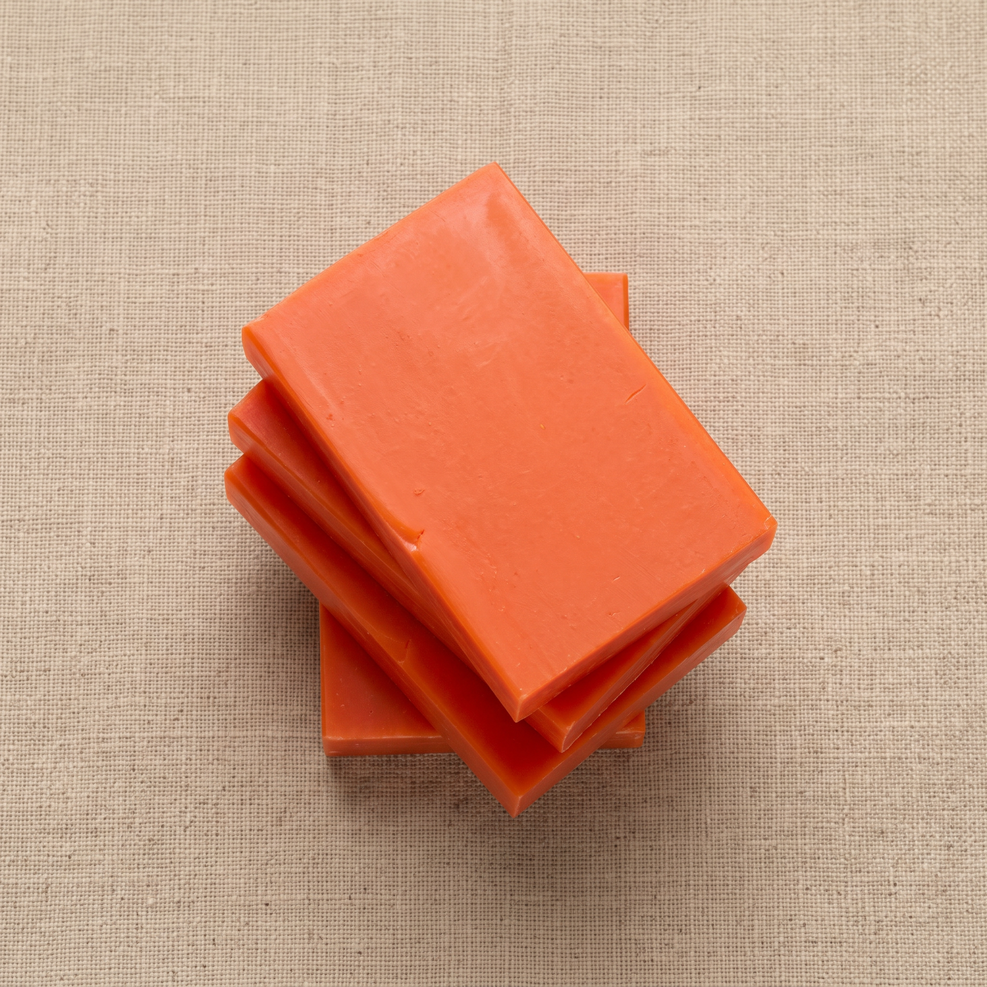 Three Avlia Kojic Acid & Turmeric Soap Bars stacked showing hand-cut edges